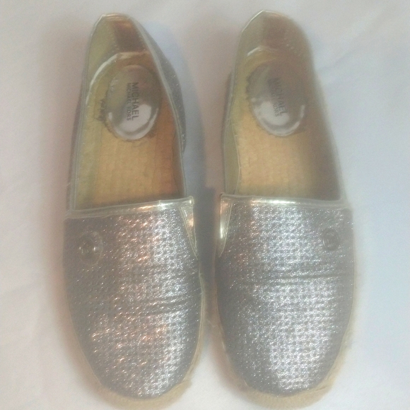 Michael Kors Shoes - Michael kors women's silver flat shoes size 9